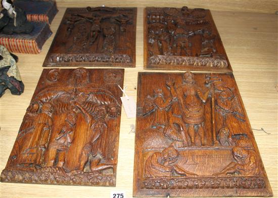 A set of four 19th century Continental relief carved oak religious plaques, depicting biblical scenes, 38 x 29cm